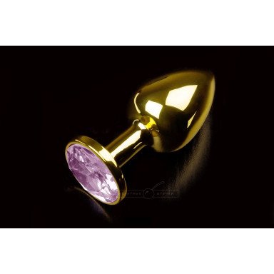 Маленькая золотистая анальная пробка с круглым кончиком и розовым кристаллом - 7 см., фото