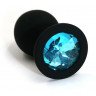 Чёрная силиконовая анальная пробка с голубым кристаллом - 7 см., фото