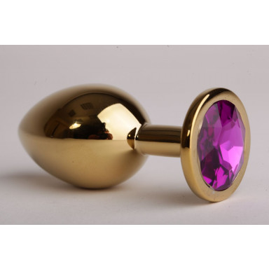 Золотистая анальная пробка с фиолетовым кристаллом - 9,5 см., фото