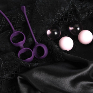 Фиолетовые вагинальные шарики Cosmo Balls с парой сменных шаров фото 3
