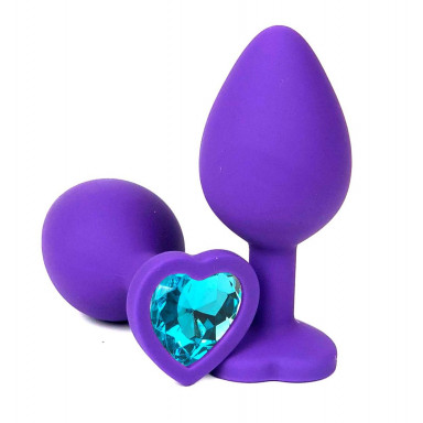 Фиолетовая силиконовая анальная пробка с голубым стразом-сердцем - 8,5 см., фото
