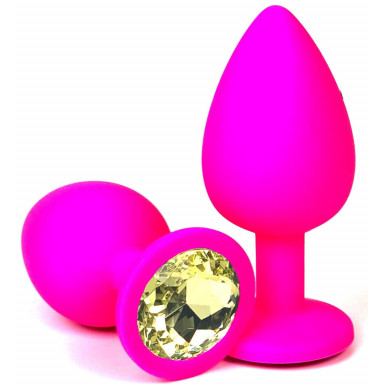 Розовая силиконовая пробка с желтым кристаллом - 6,8 см.