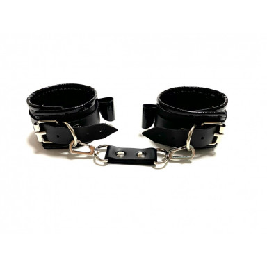 Черные наручники с бантиками из эко-кожи фото 2
