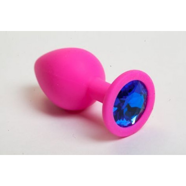 Розовая силиконовая пробка с синим кристаллом - 7 см., фото