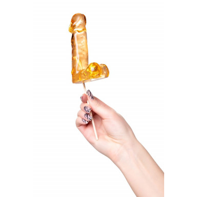 Оранжевый леденец в форме пениса со вкусом аморетто фото 5