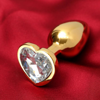 Золотистая анальная пробка с прозрачным кристаллом в форме сердца фото 2
