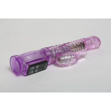 Фиолетовый силиконовый вибратор с подвижной головкой в пупырышках - 21 см. фото 2
