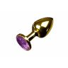 Маленькая золотистая анальная пробка с круглым кончиком и фиолетовым кристаллом - 7 см., фото